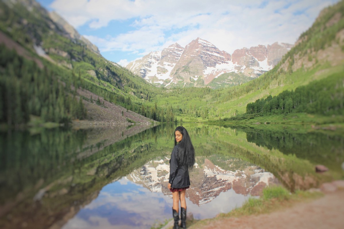 Girl in front of Maroon Bells in Aspen