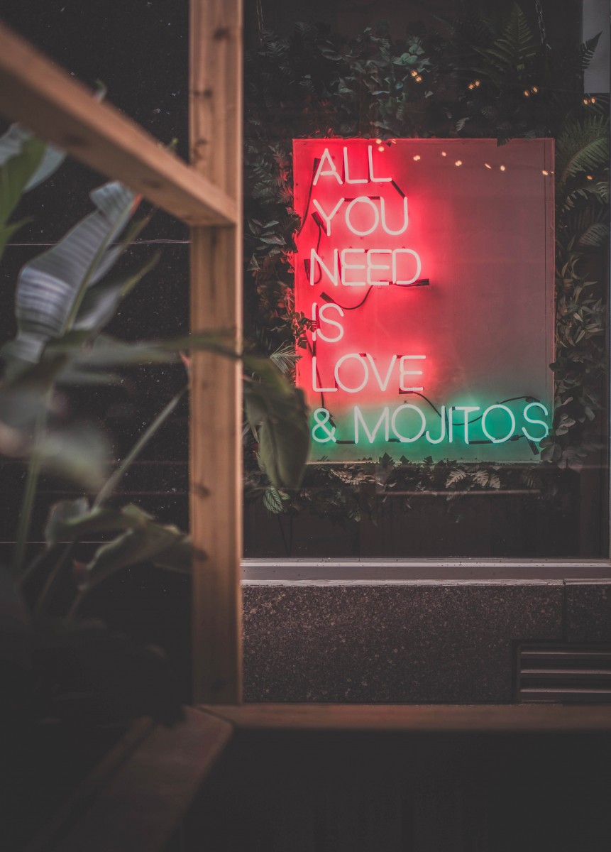 Montreal all you need is love & mojitos sign (this is why Montreal is one of the best party cities in Canada)