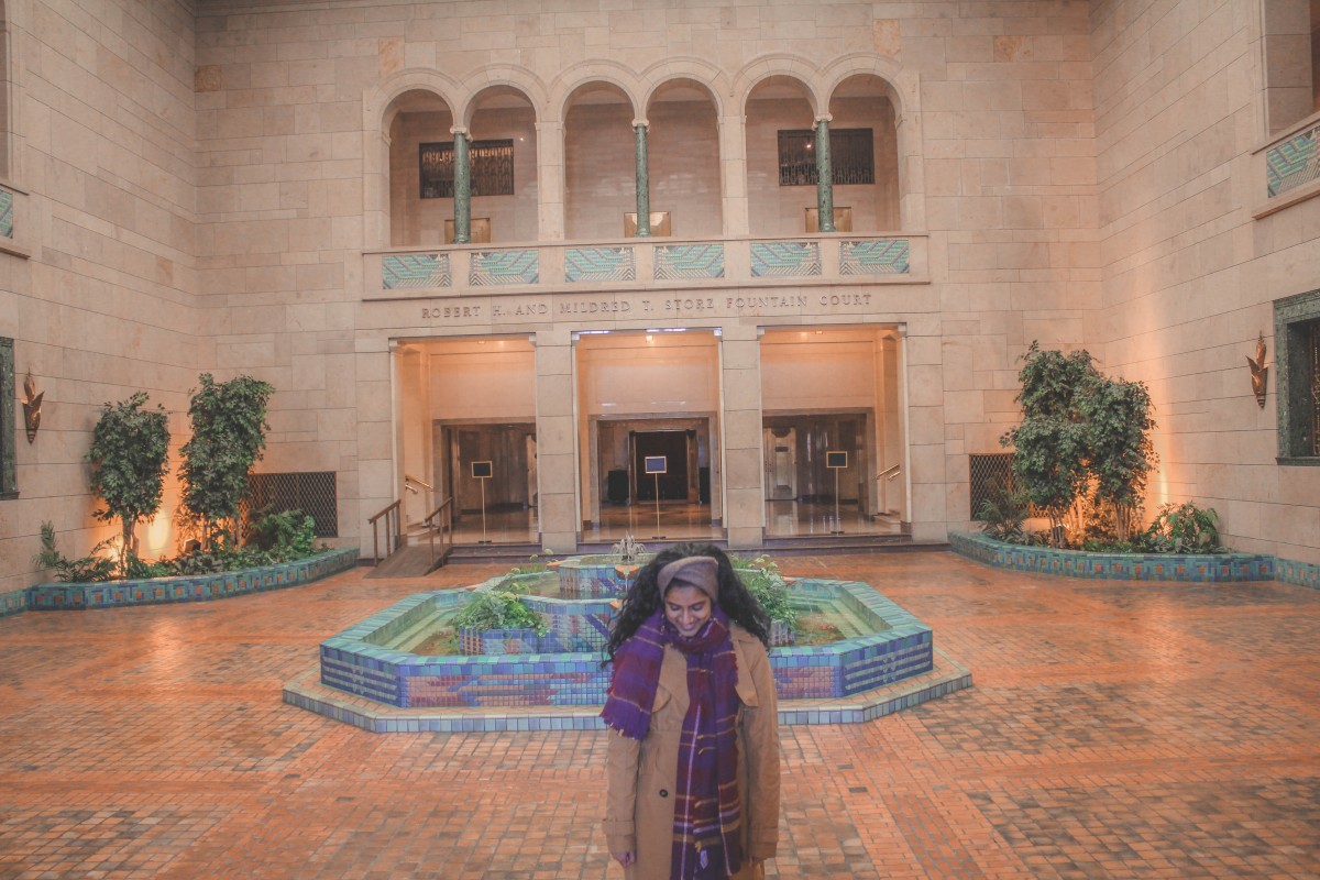 standing in the Storz Fountain Court at the Joslyn Art Museum