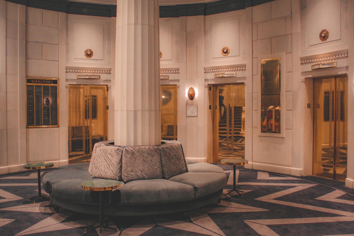 lobby of the Candler Hotel Atlanta with gold elevator doors
