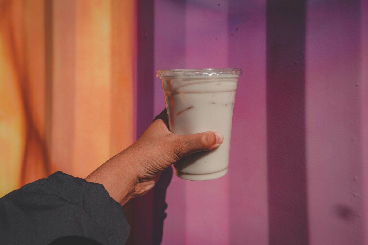 holding up a cup of cocohorchata in El Paso
