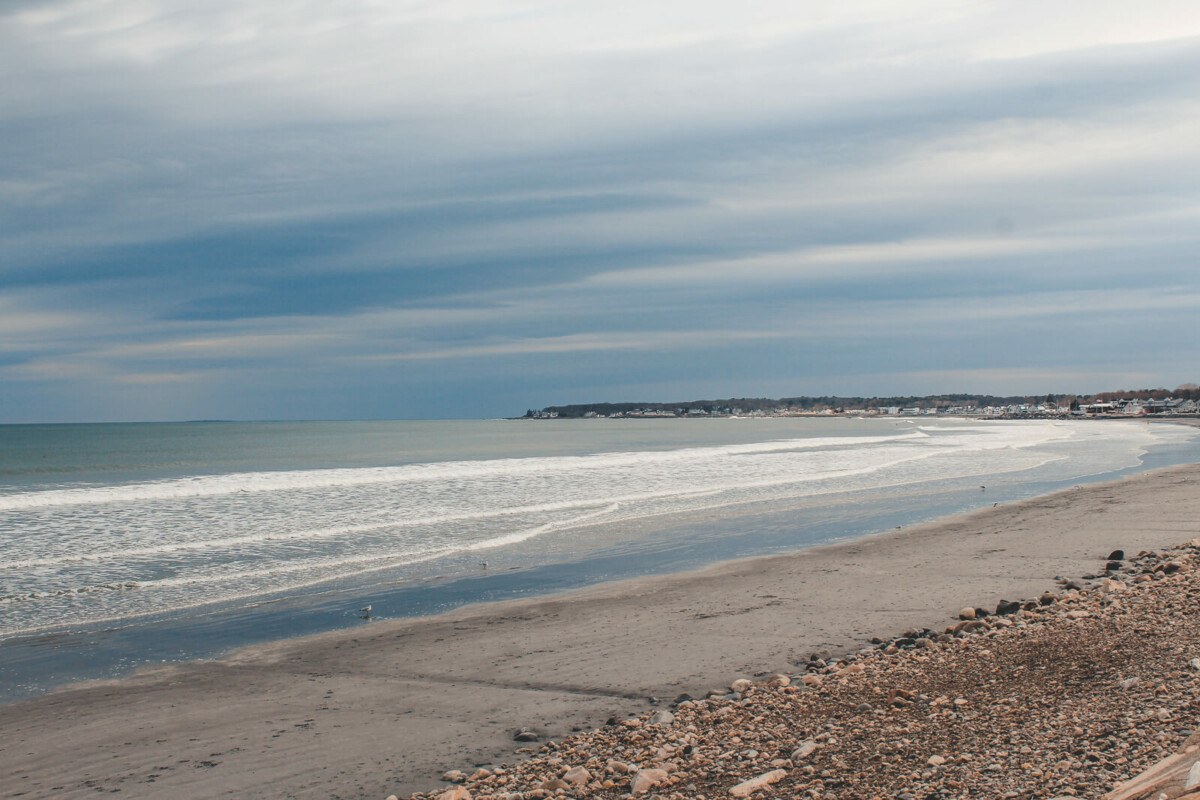long stretch of Long Sands Beach, one of the prettiest beaches in York, Maine